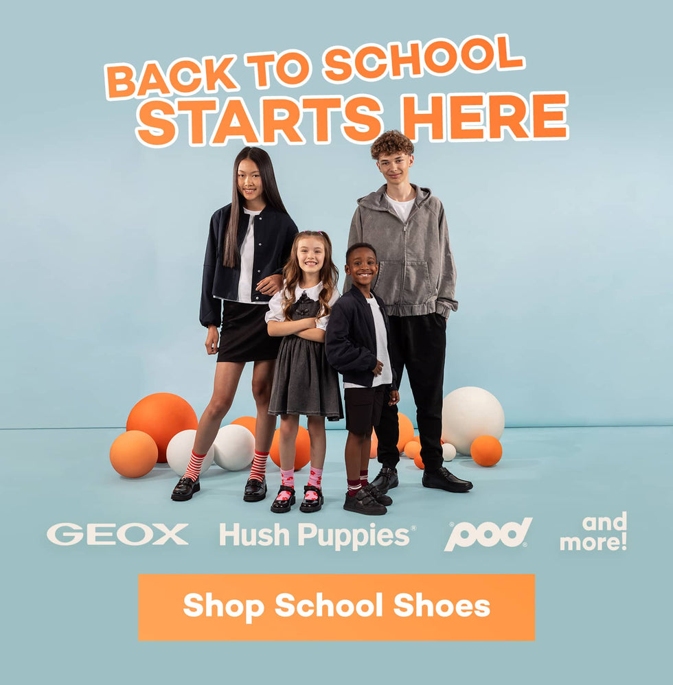 A promotional banner for school shoes featuring four children standing on the left, orange and white balloons, and large text reading 'BACK TO SCHOOL STARTS HERE' with 'Shop School Shoes' and brand logos including GEOX, Hush Puppies, pod, and more! at the bottom. Click to shop school shoes.